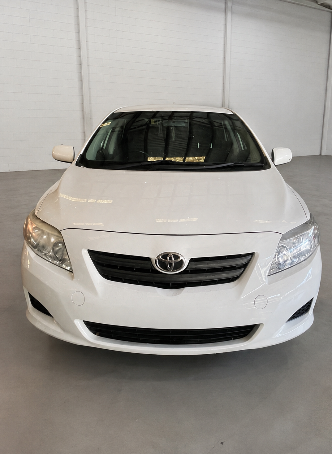 2007 2 TOYOTA COROLLA SEDAN - WHITE